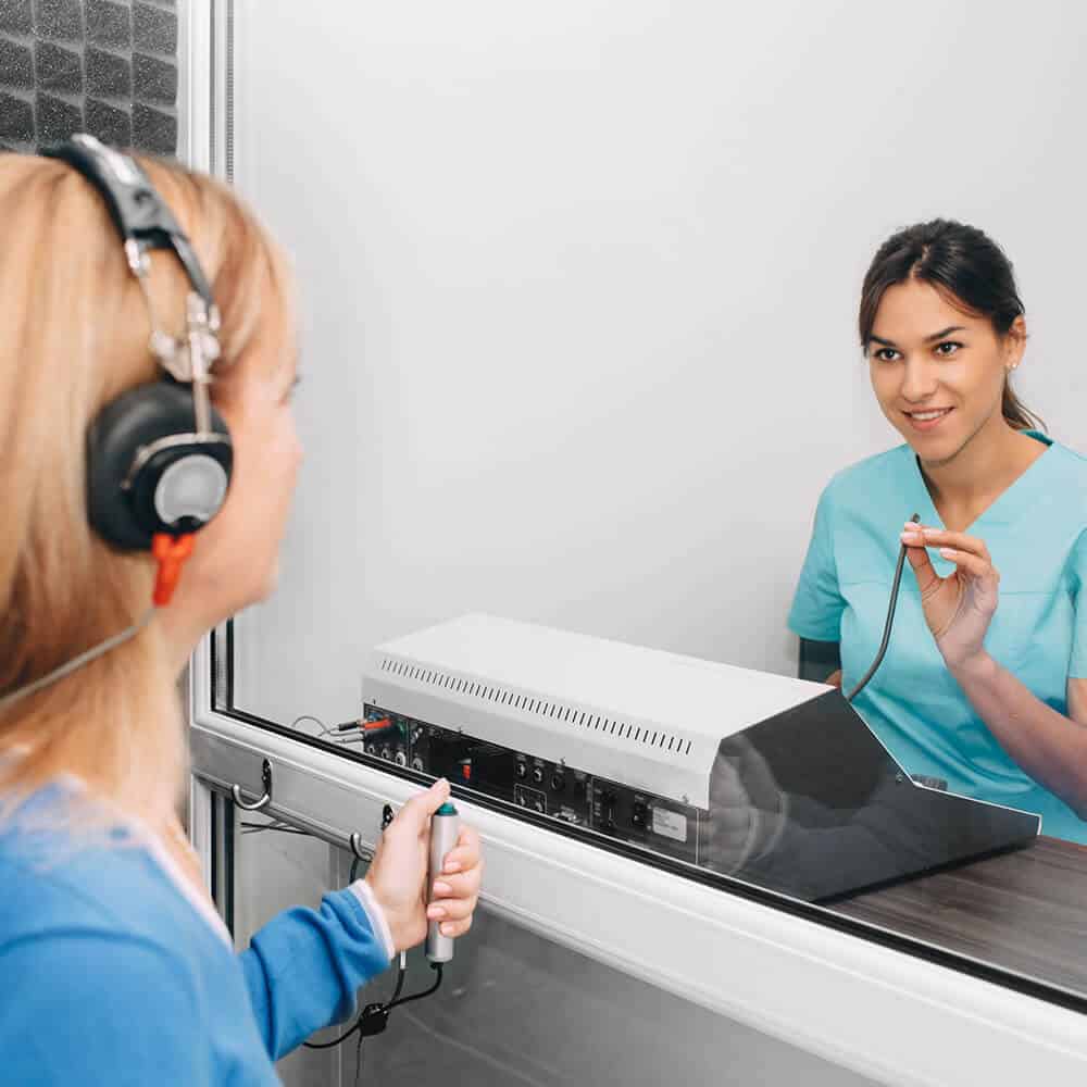 hearing test in progress in hearing center